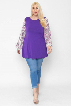 Floral Print, Contrasting Bubble Sleeves Tunic With A Round Neckline.